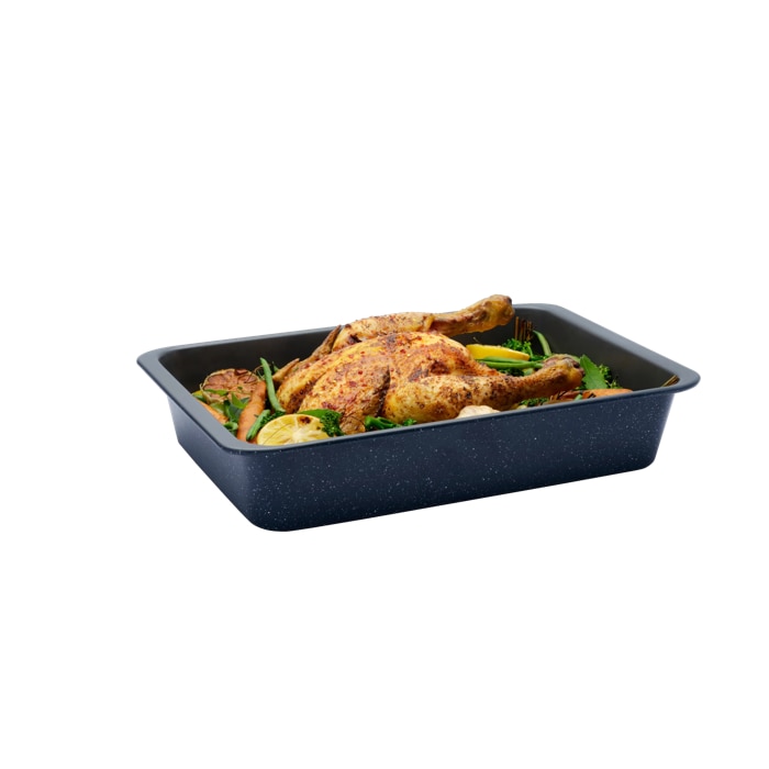 Product in use, whole chicken with vegetables and herbs